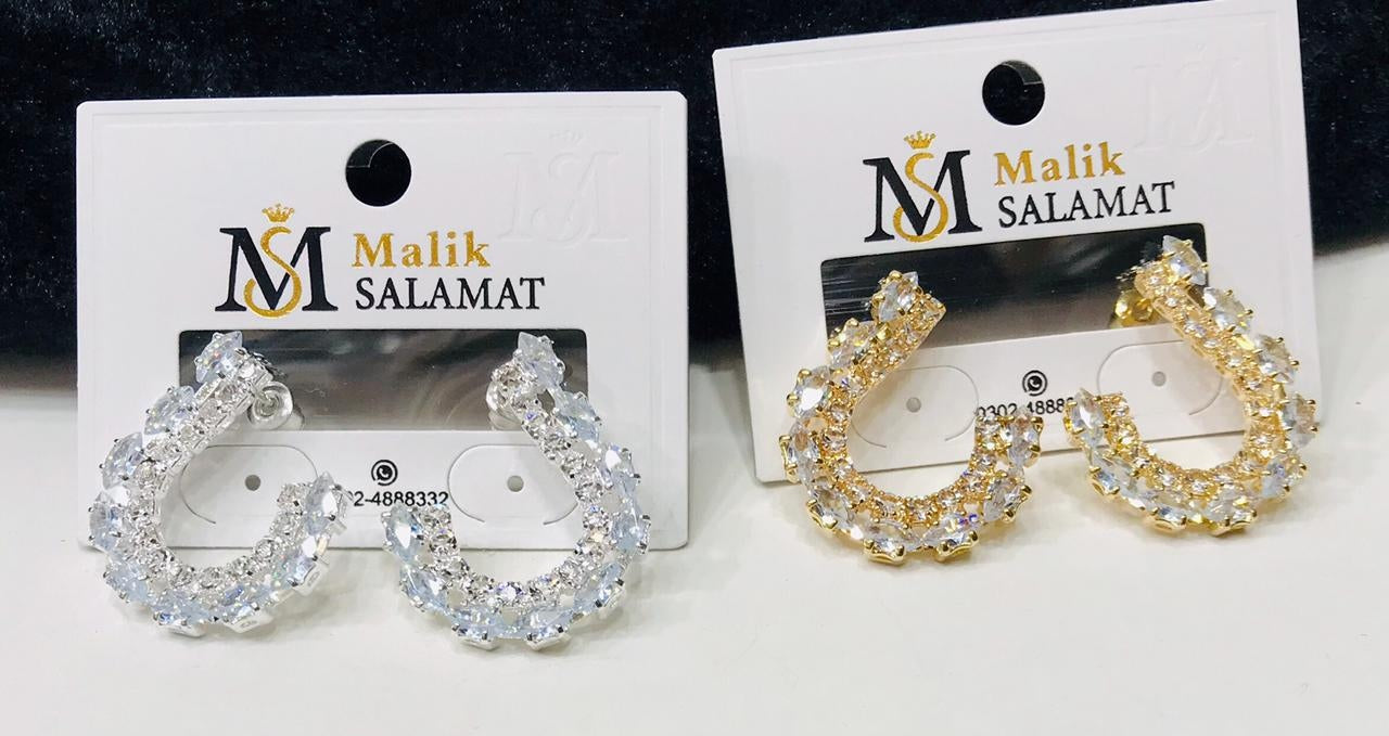 woman fancy earrings - CH. SON'S JEWELER